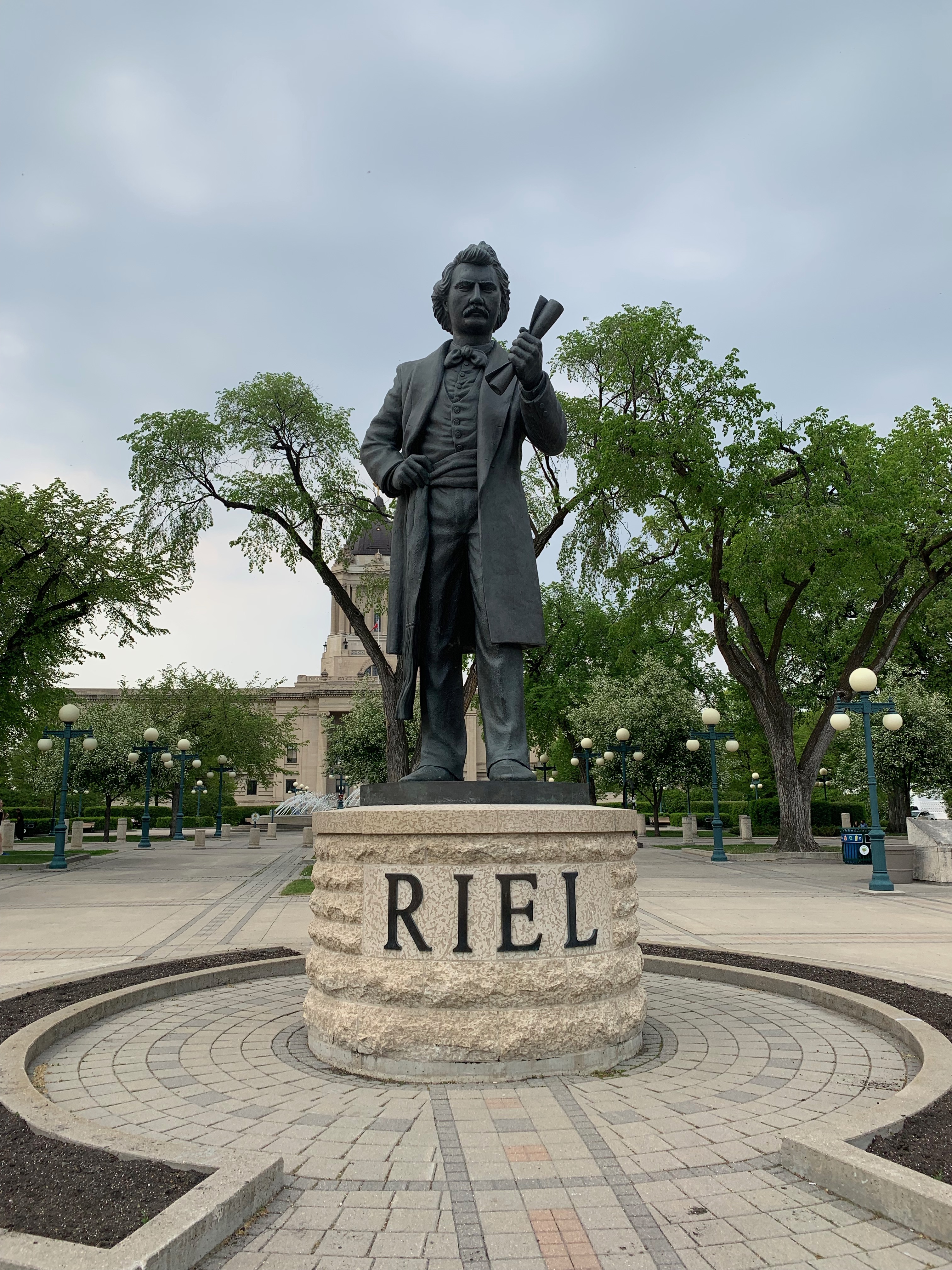 Louis Riel outside the Manitoba Legislature