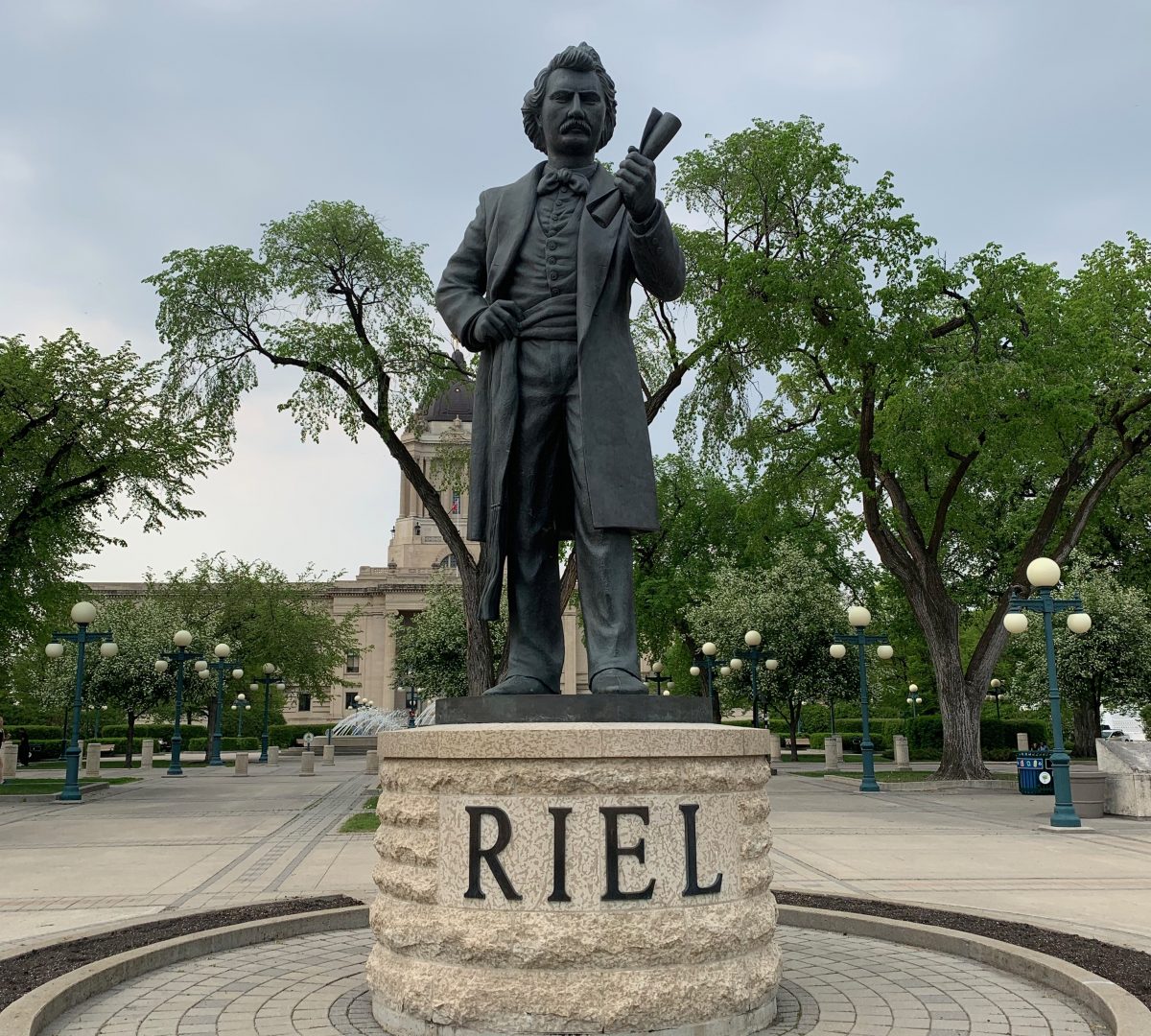 Louis Riel outside the Manitoba Legislature